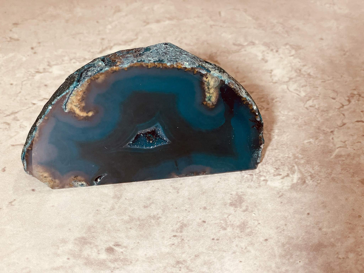 Brazilian Cut Agate geode with unique colors and crystal formations, measuring 3-4 inches.