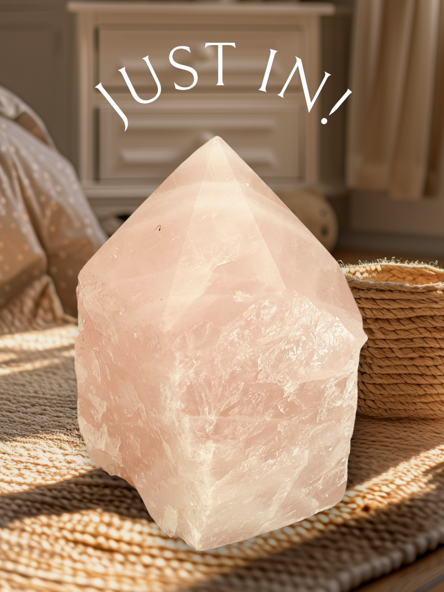 Rose Quartz Cut Base Point on woven mat, natural pink hues, decorative crystal.