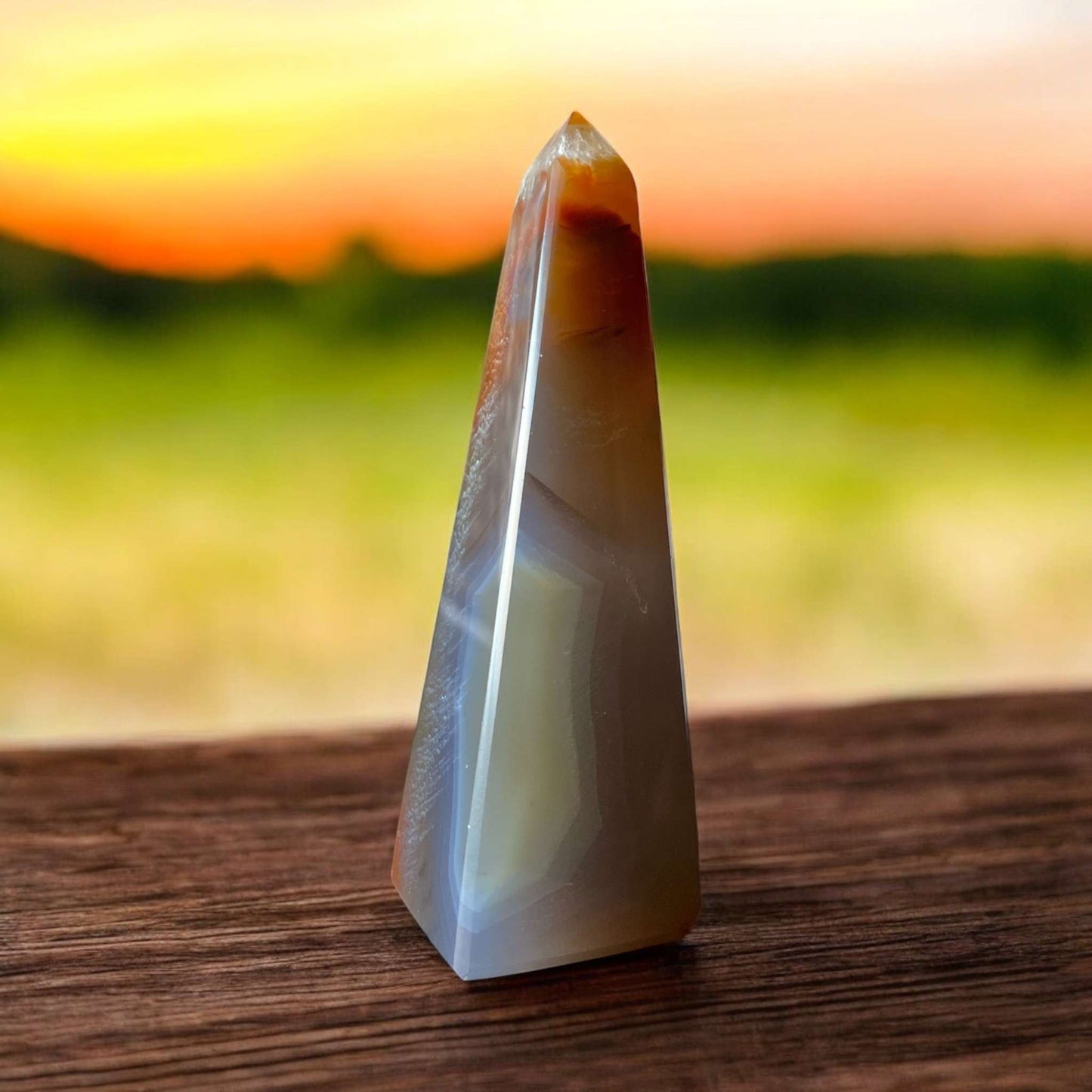 Agate Obelisk with natural banding, 85mm high, for grounding, protection, and emotional balance.