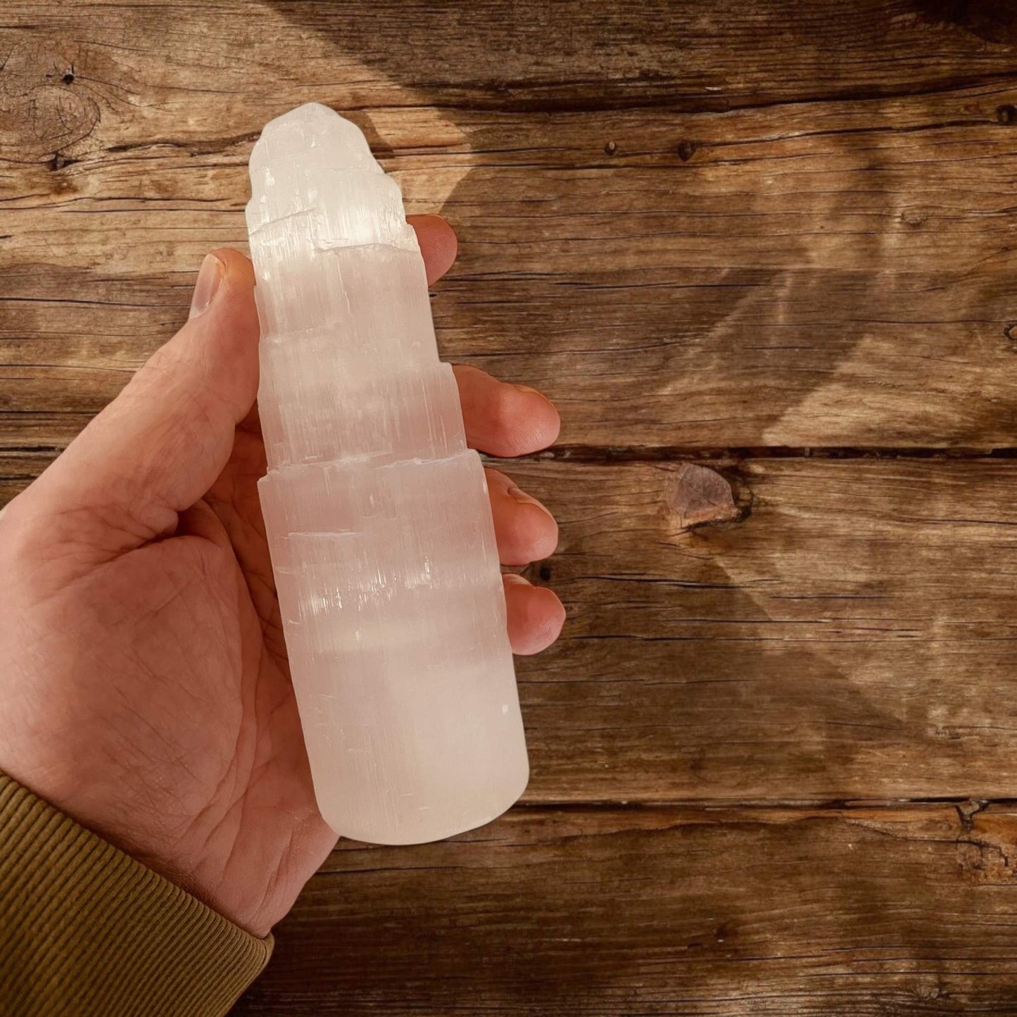 Selenite Tower 150mm with LED stand for energy cleansing and decor.