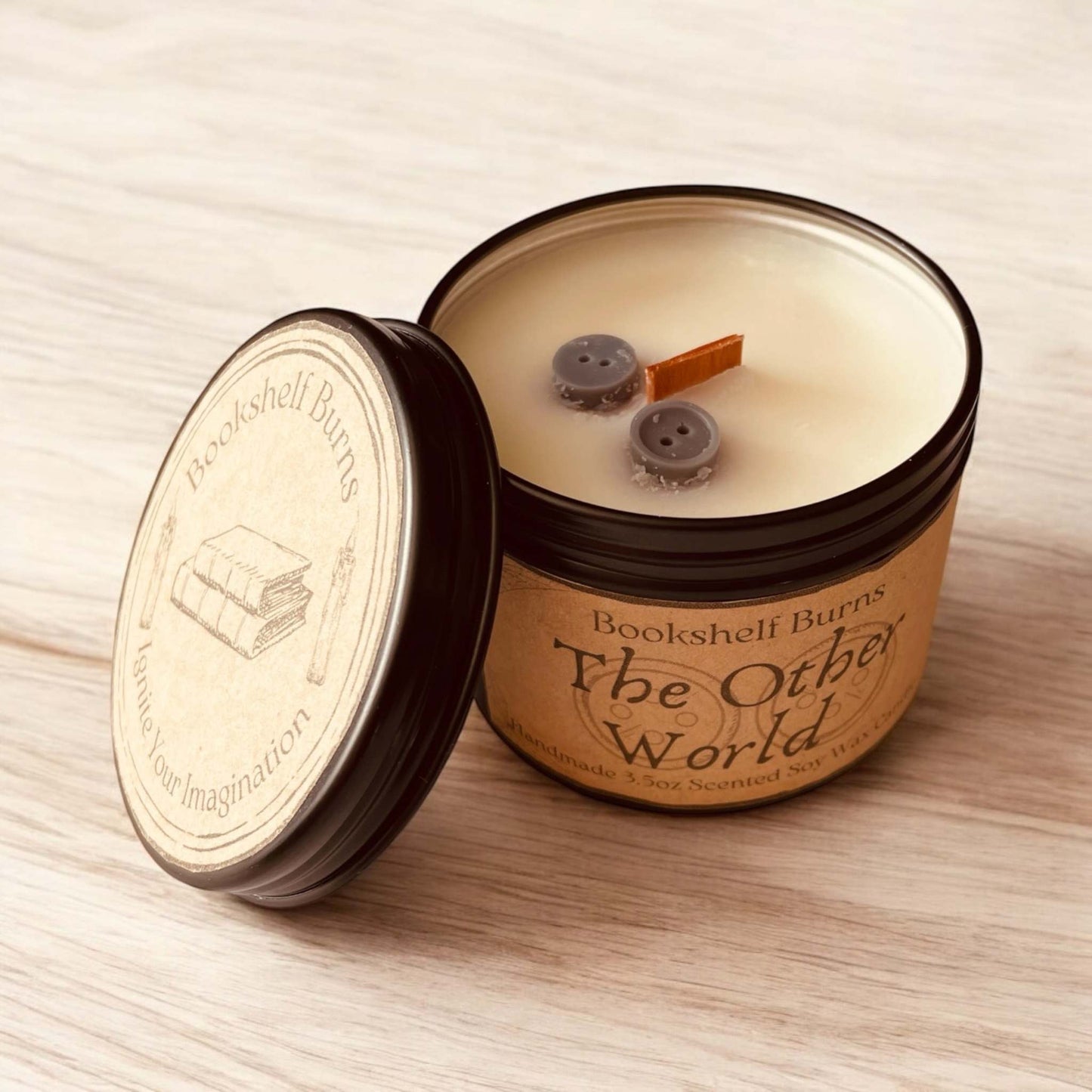 Hand poured scented candle in tin with wood wick, inspired by classic stories.