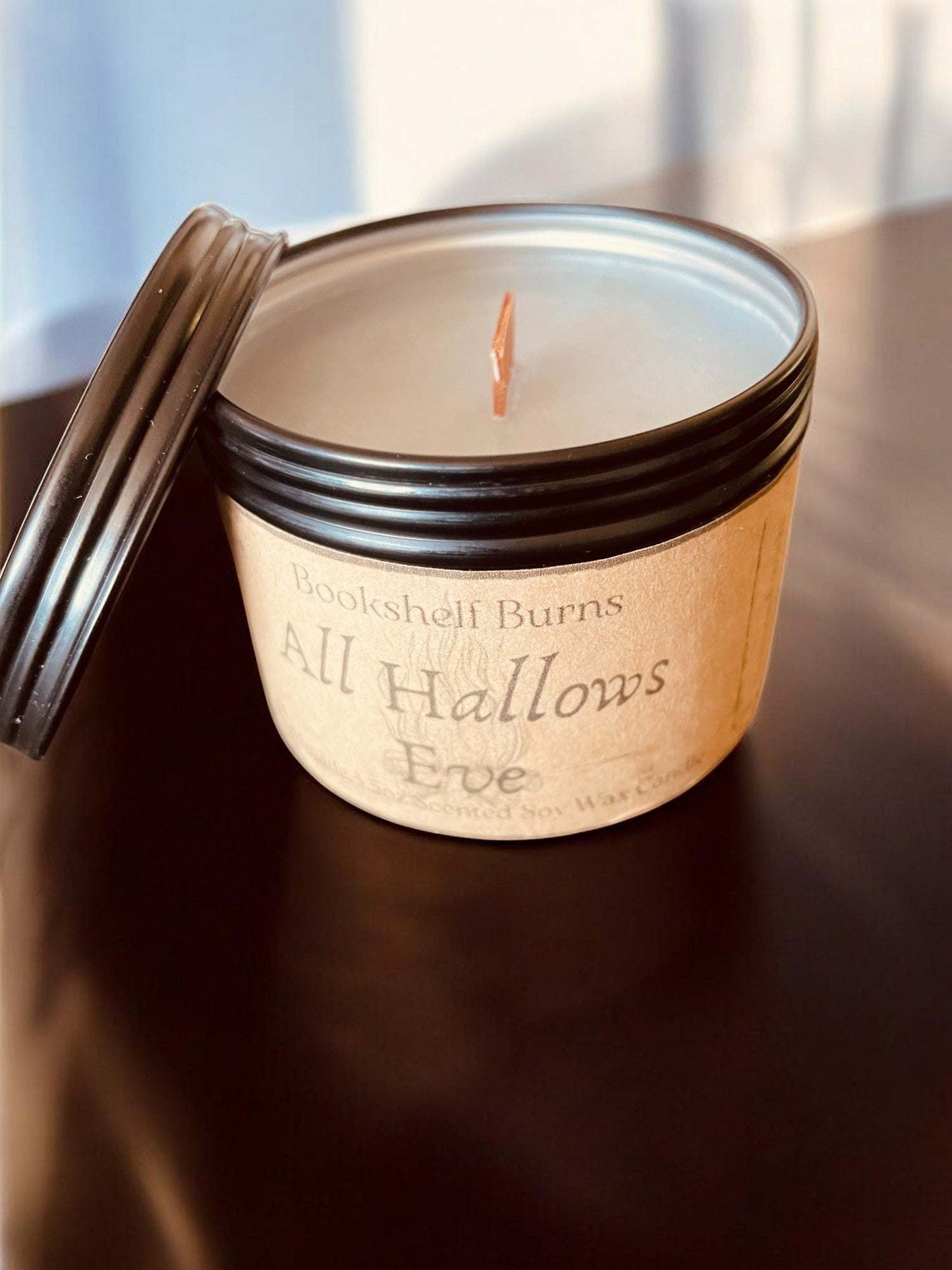 Hand poured scented candle with lid, inspired by literary classics, in a beautifully designed tin.