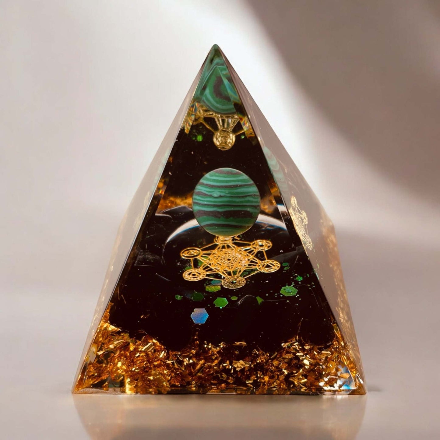 Orgonite Pyramid enhancing positive energy and harmony in spaces.