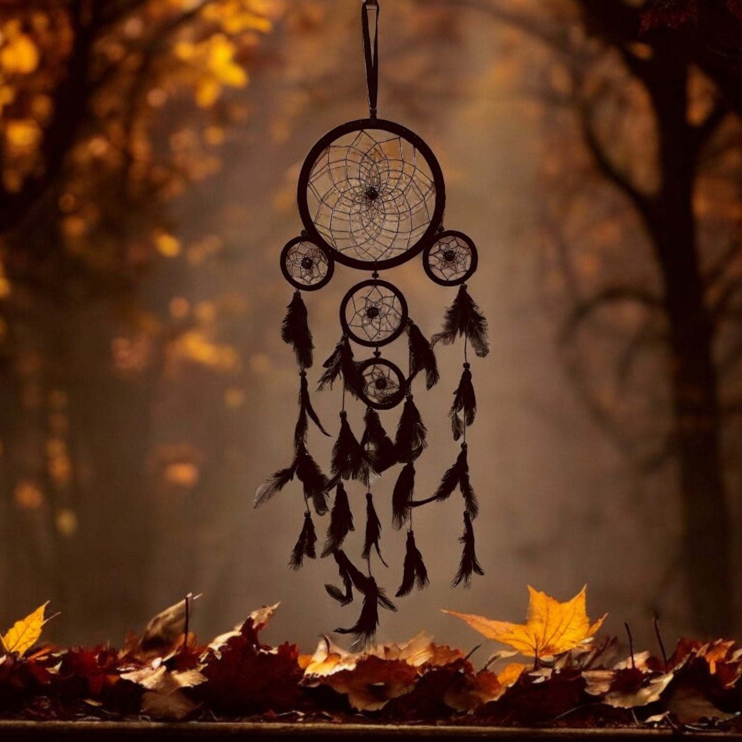 Indian style multi-ring Dreamcatcher with intricate details and multiple rings displayed in an autumn setting.