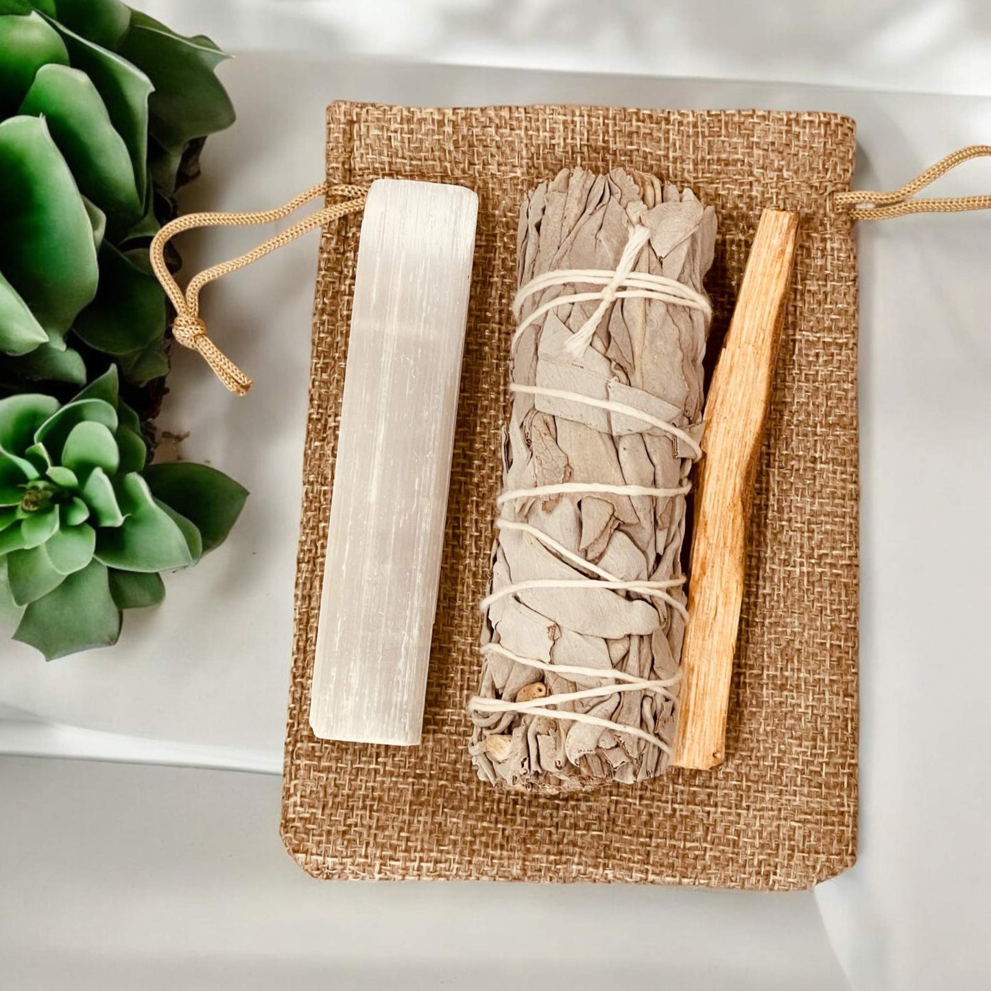Home Cleansing kit, selenite, white sage, Palo santo, top view