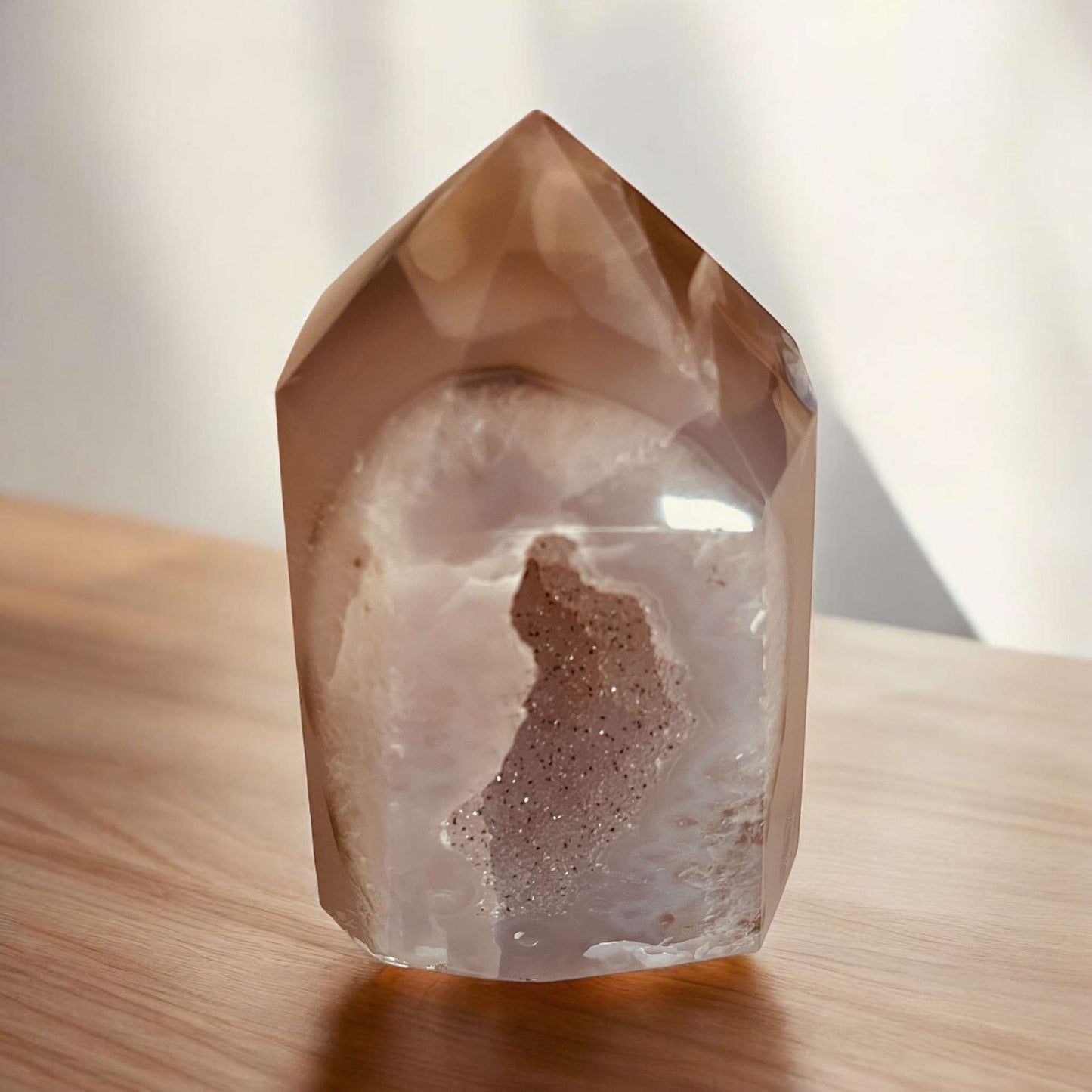 Druzy Agate Point crystal with natural shimmering druzy crystals, 80mm tall, on a wooden surface.