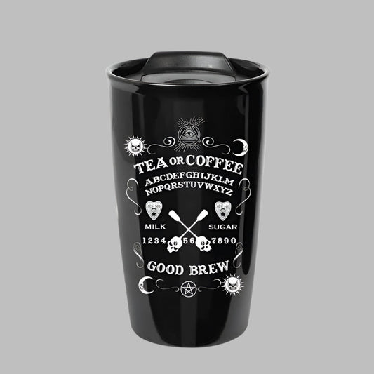 Black ceramic travel mug with mystical symbols and text, part of the Magical Ceramics collection.